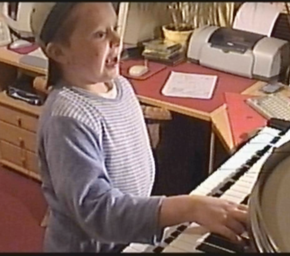 Cedric as a young child at the piano